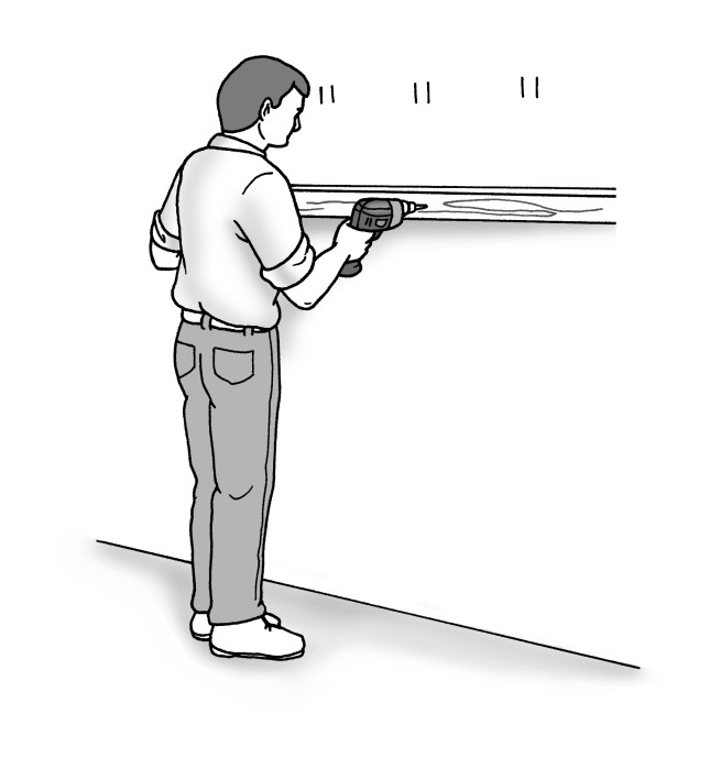 Figure 2-3: Attach a ledger board to support wall cabinets temporarily.